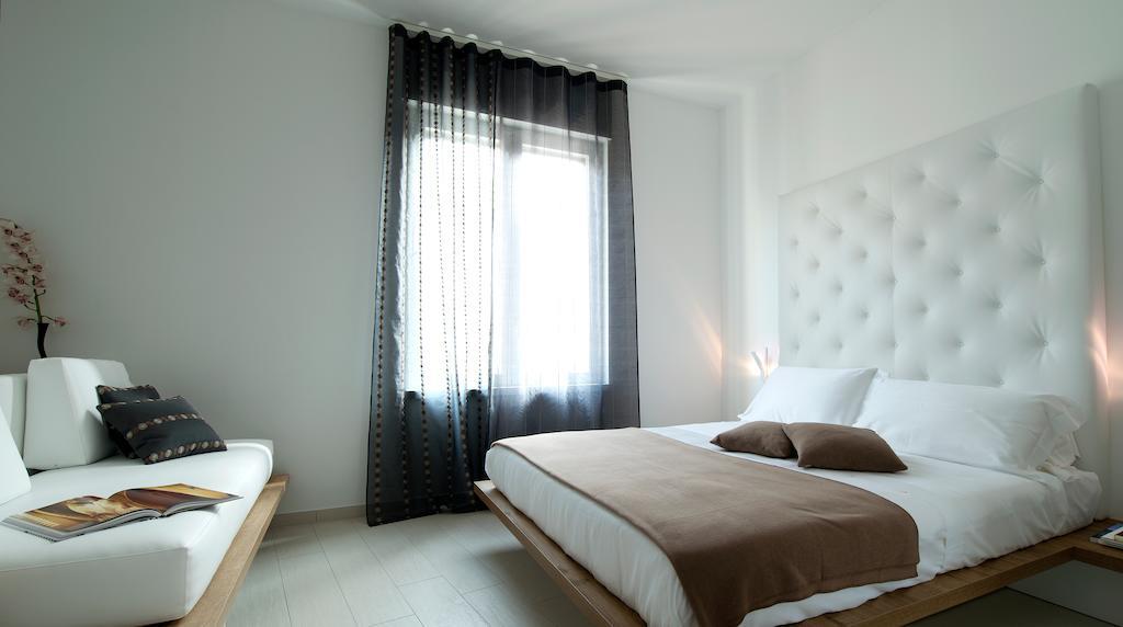 Aparthotel Duomo Milão Quarto foto