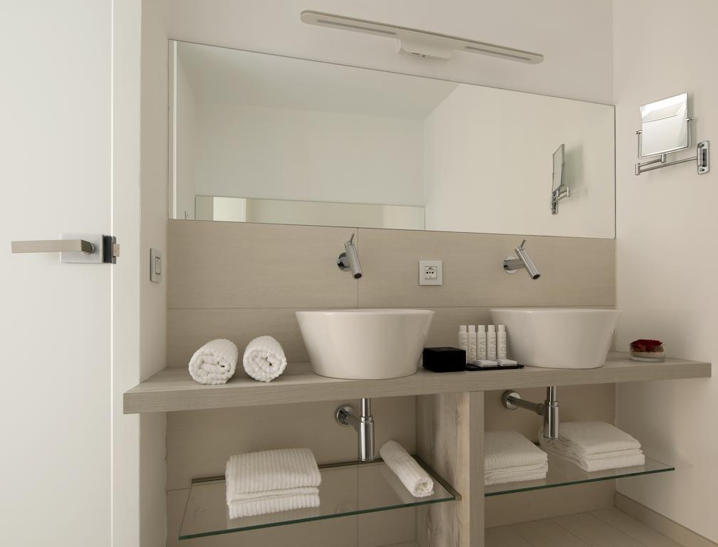 Aparthotel Duomo Milão Quarto foto